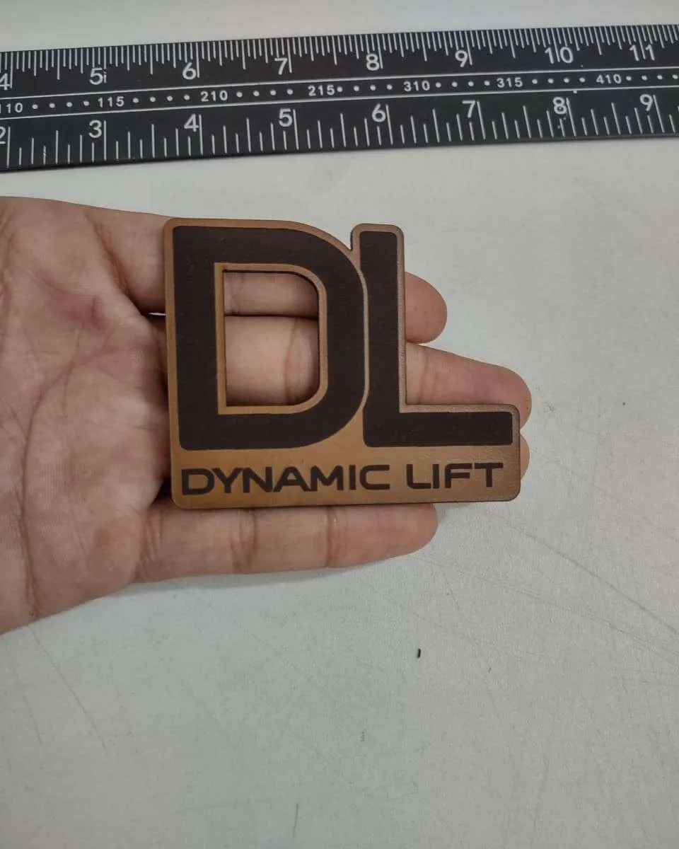 Premium leather patch with embossed logo design - Example 3 by Dynamic Digitizers USA